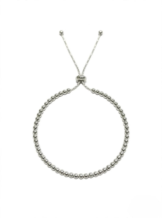 Pulsera ajustable con bolitas